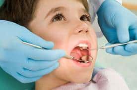 Смена молочных зубов постоянными у детей